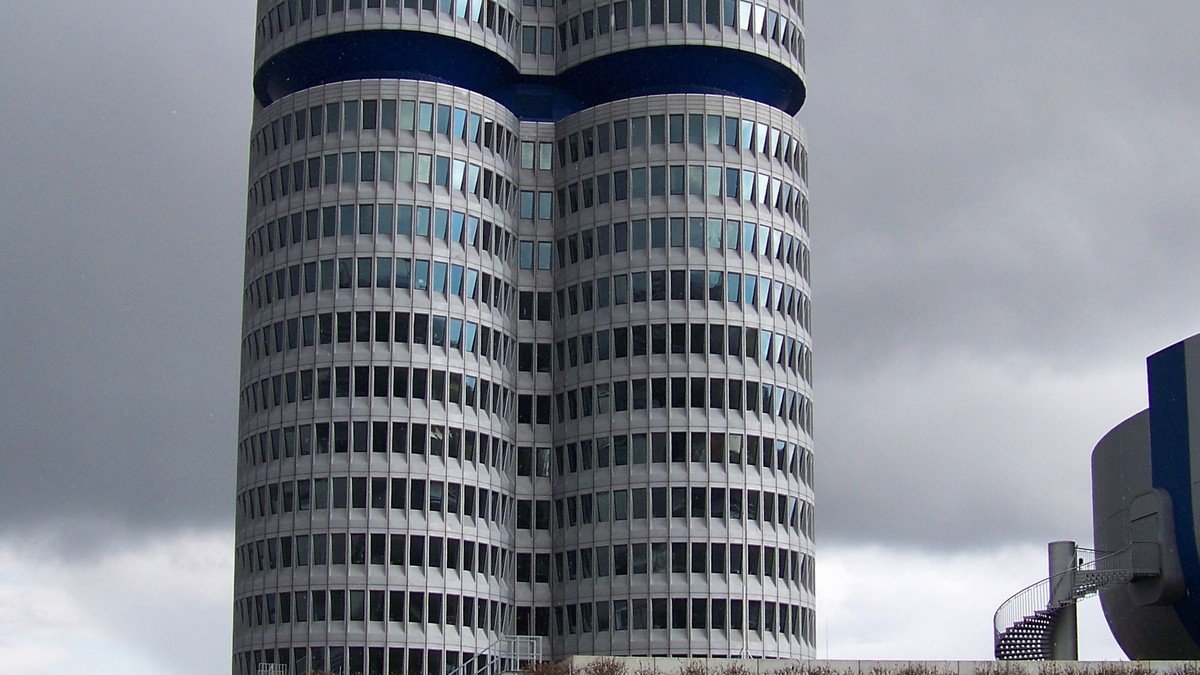 Modern BMW luxury sedan in an authorized technical inspection service bay