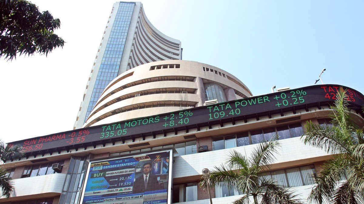 Mumbai stock exchange digital trading display showing Sensex and Nifty indices climbing past record peaks