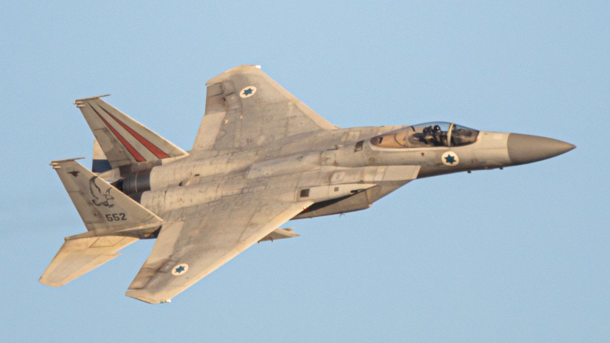 Israeli Air Force fighter jets and refueling tanker aircraft conducting long-range operations over the Red Sea corridor