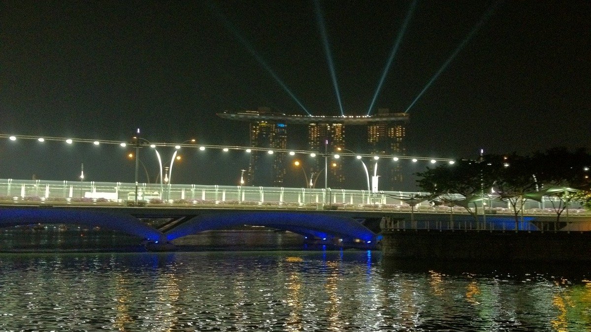 Illuminated Marina Bay Street Circuit asphalt track under floodlights at night