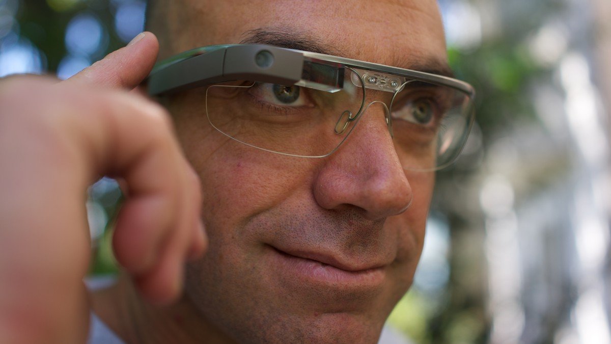 Close-up of futuristic holographic augmented reality smart glasses displaying virtual interface elements