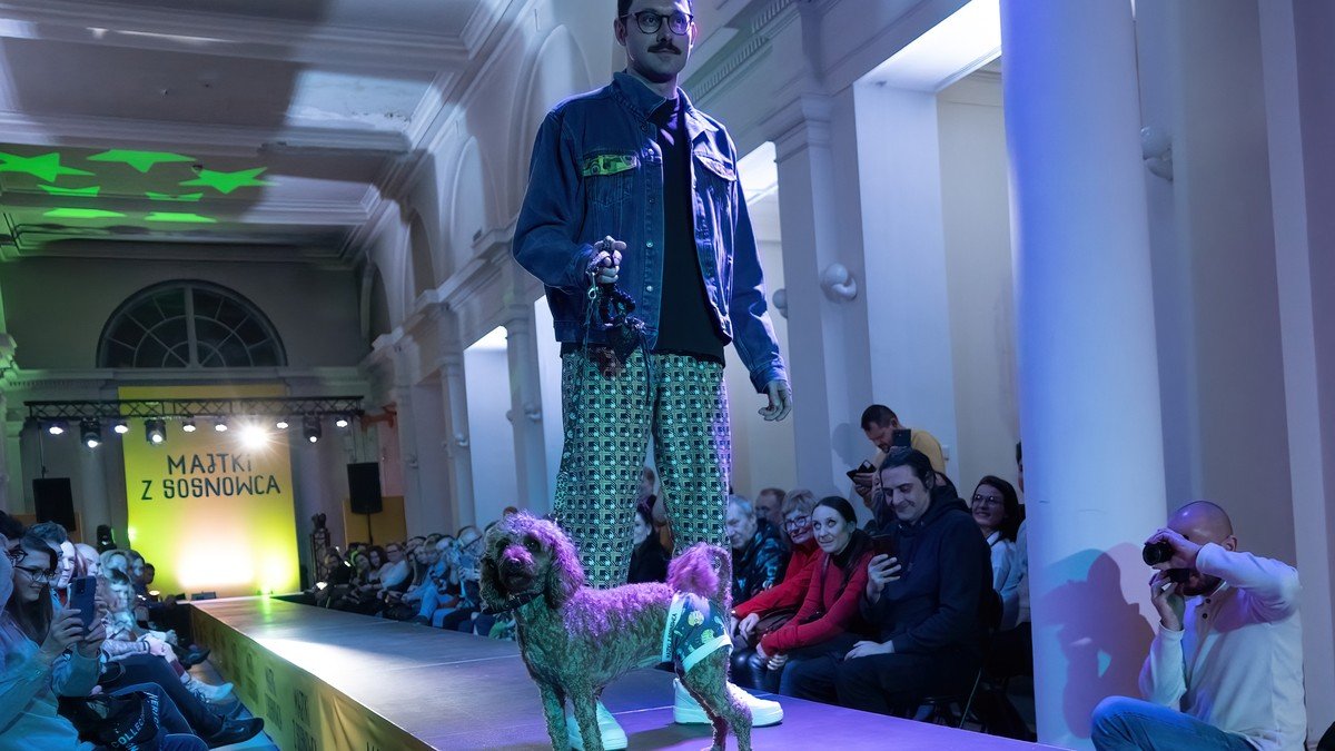 Models walking the illuminated runway during the Paris Fashion Week Womenswear Spring/Summer 2025 presentations in Paris
