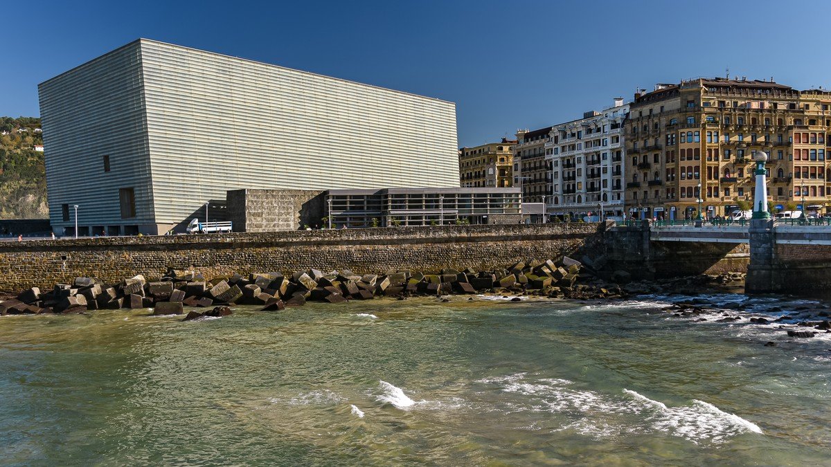 Kursaal auditorium illuminated at night during the San Sebastián International Film Festival