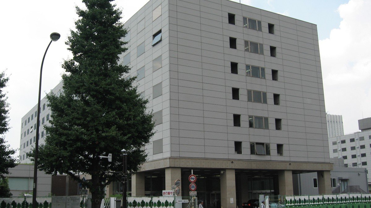 The National Diet Building in Tokyo under clear skies during high-level political announcements