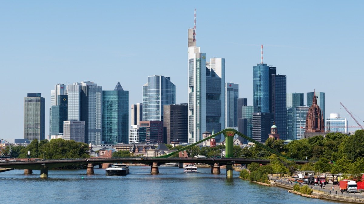 European financial banking district skyline featuring modern glass high-rise towers along the waterfront
