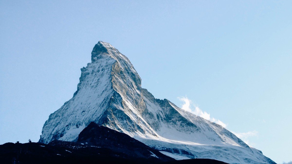 High-alpine glacier ridge and snowfields beneath the Matterhorn along the border between Zermatt, Switzerland, and Cervinia, Italy