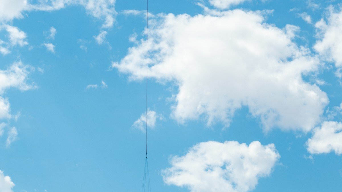 Joby Aviation electric vertical takeoff and landing aircraft hovering above a runway with Toyota branding in Japan