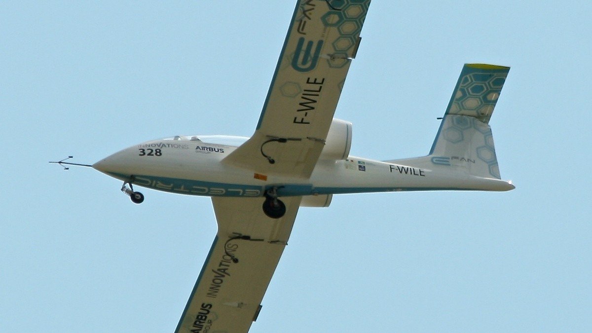 Joby Aviation electric air taxi aircraft flying in clear skies with Toyota engineers collaborating