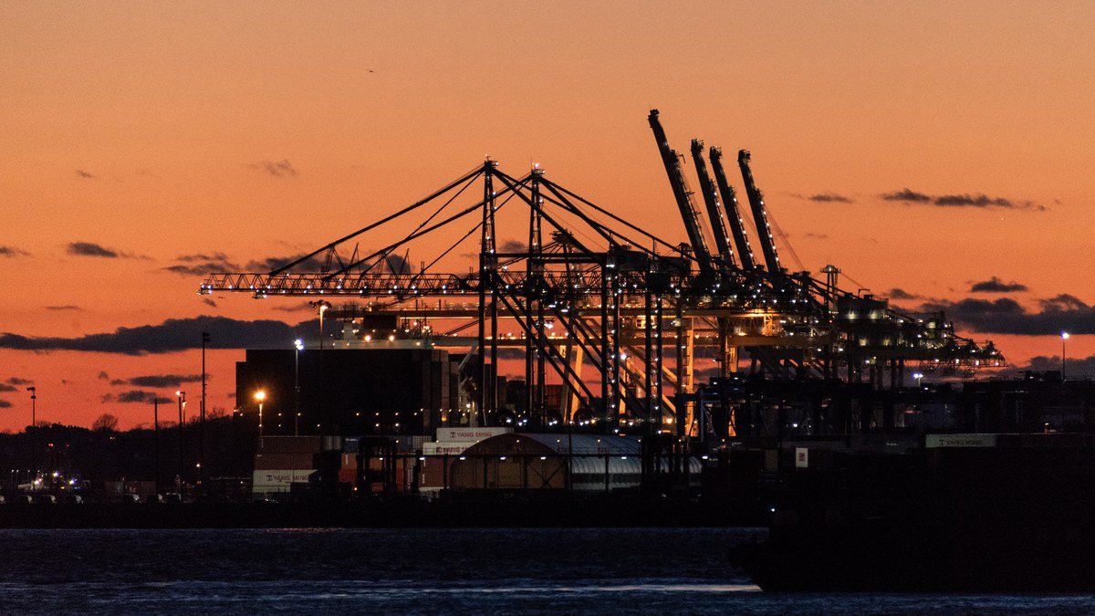 Container ships and gantry cranes at a major US East Coast maritime port terminal
