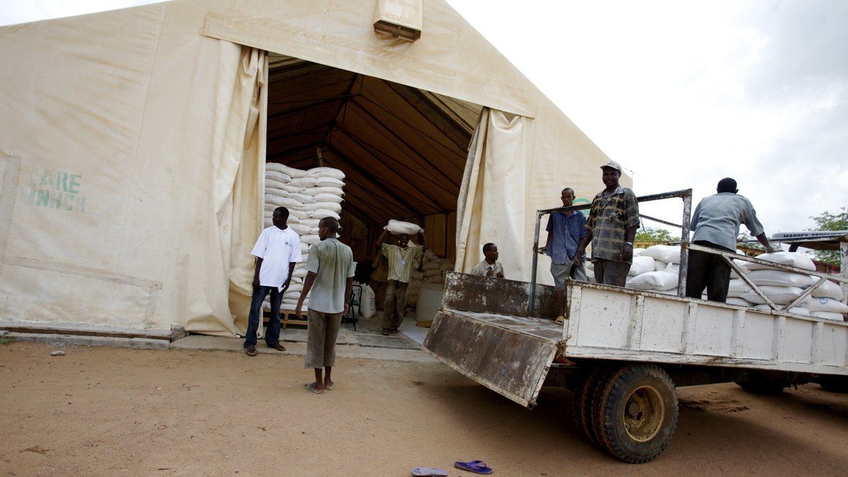 Humanitarian relief aid warehouse stacked with World Food Programme food rations